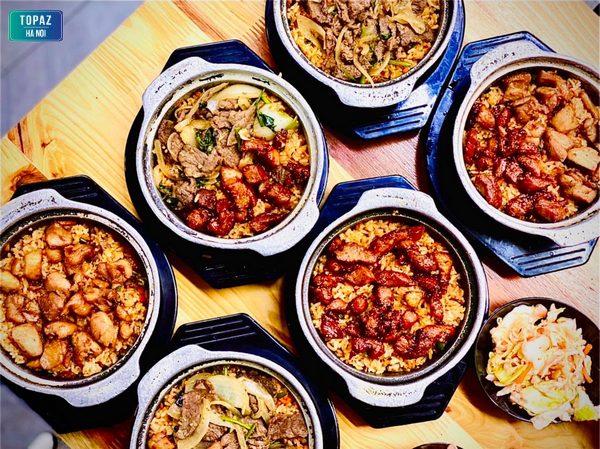 Cơm thố Bách Khoa được rất nhiều người yêu thích bởi cơm được nấu theo công thức chuẩn của người Trung